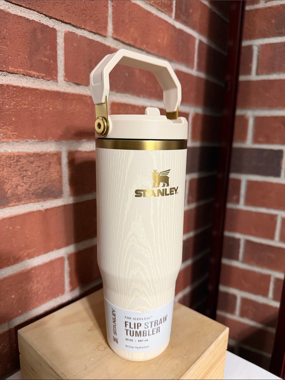 Stanley Cream and Gold Flip Straw Tumbler with Handle